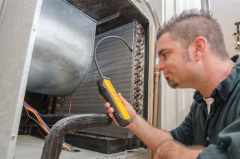 Technician Repairing Cooling Systems