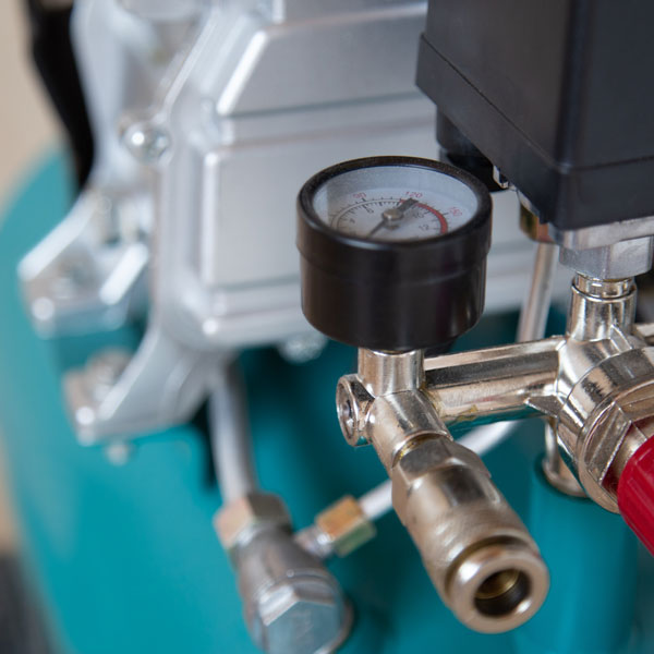 closeup of air compressor gauge